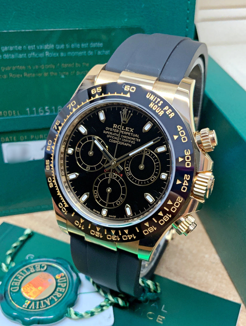 Rolex Daytona Yellow gold, black sphere