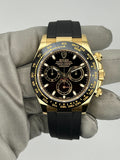 Rolex Daytona Yellow gold, black sphere